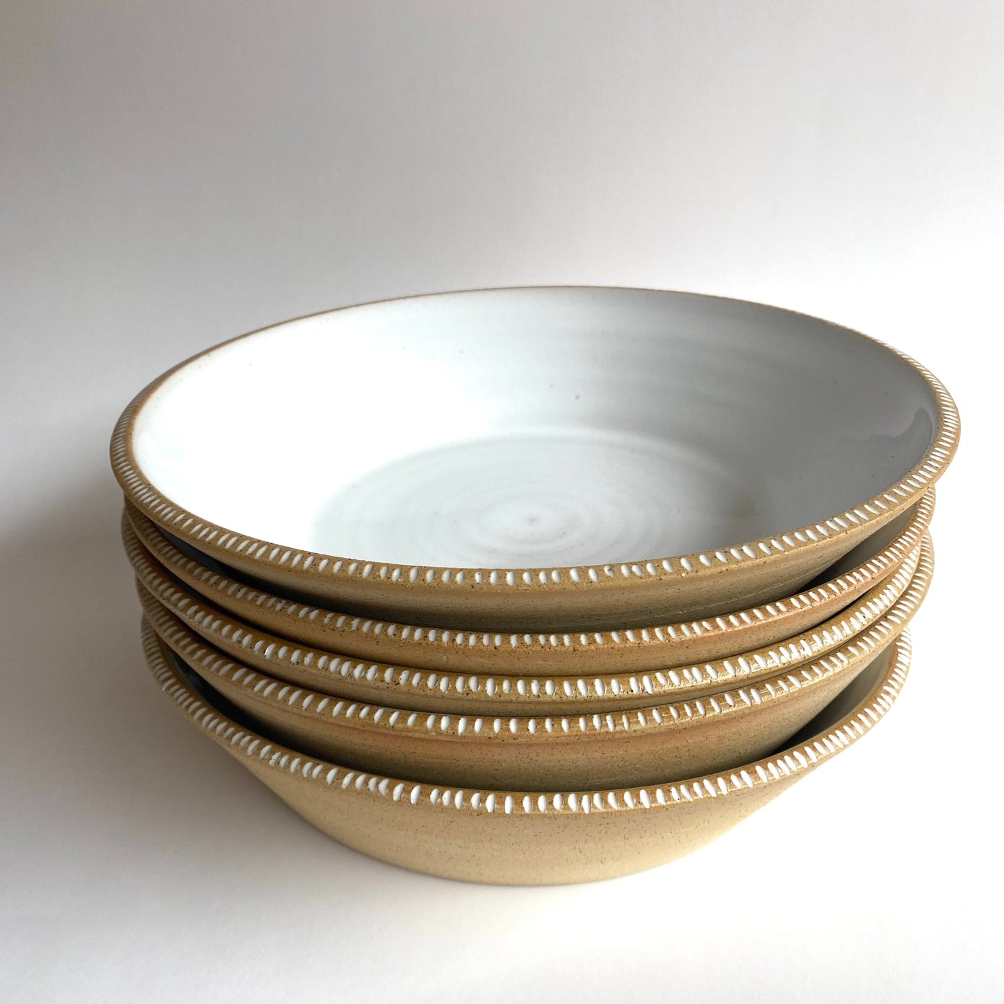 Angled Dinner bowl: Sand / White